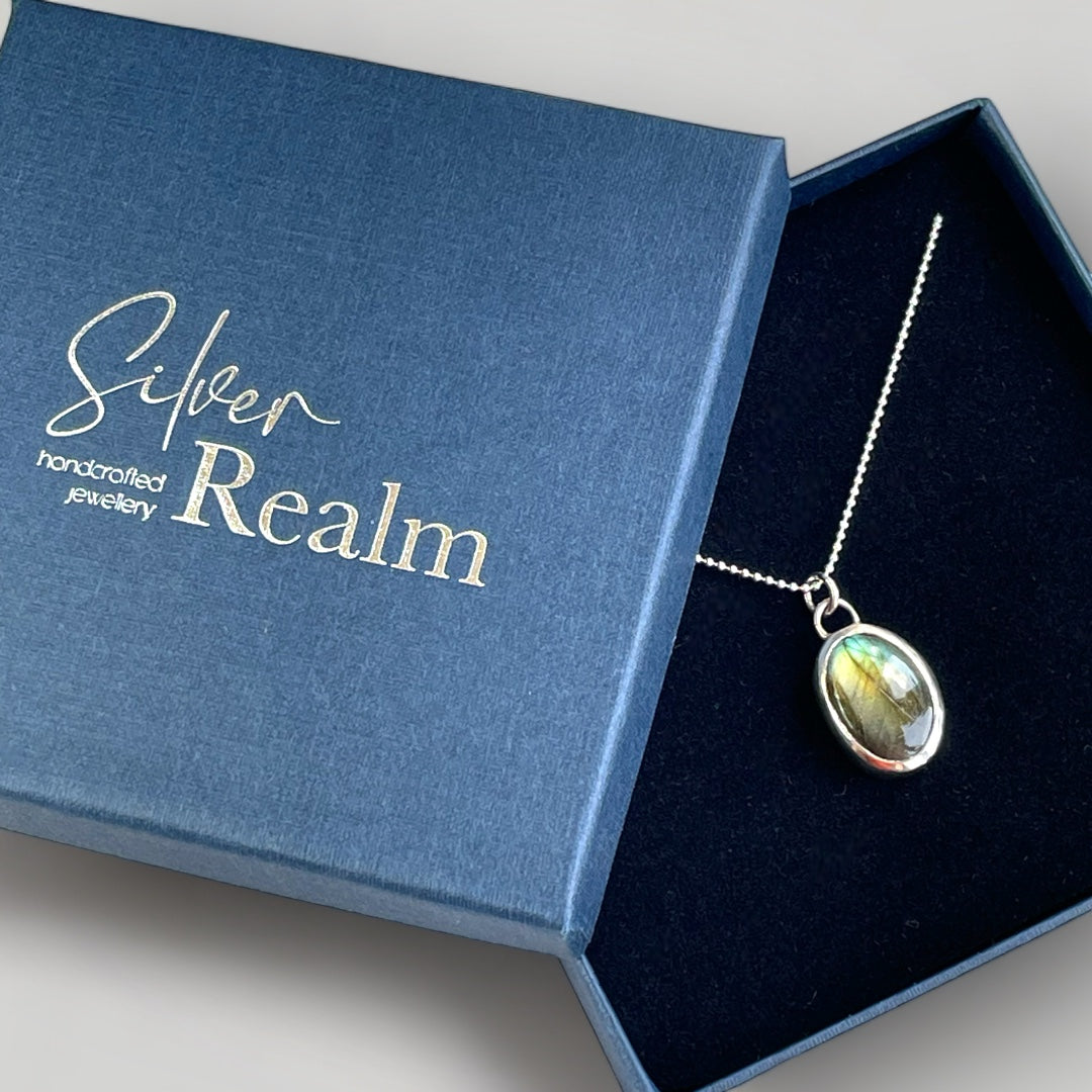 Sterling silver pendant set with an oval Labradorite on a sterling silver chain