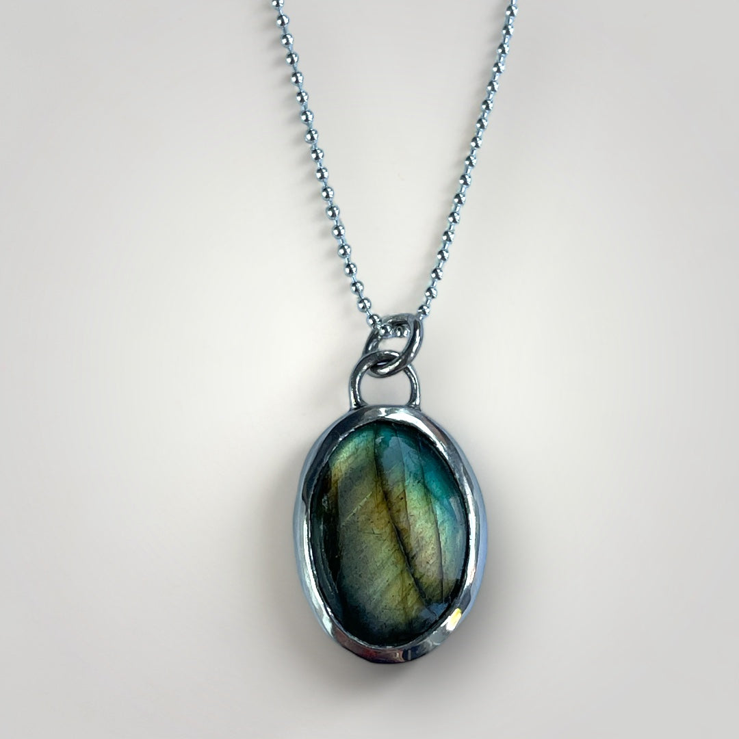 Oval Labradorite pendant in sterling silver on a sterling silver chain