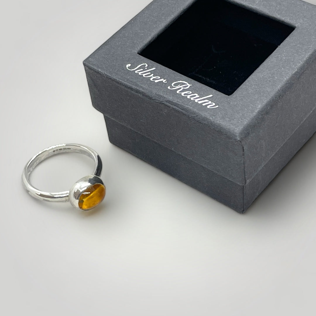 a sterling silver ring set with Citrine