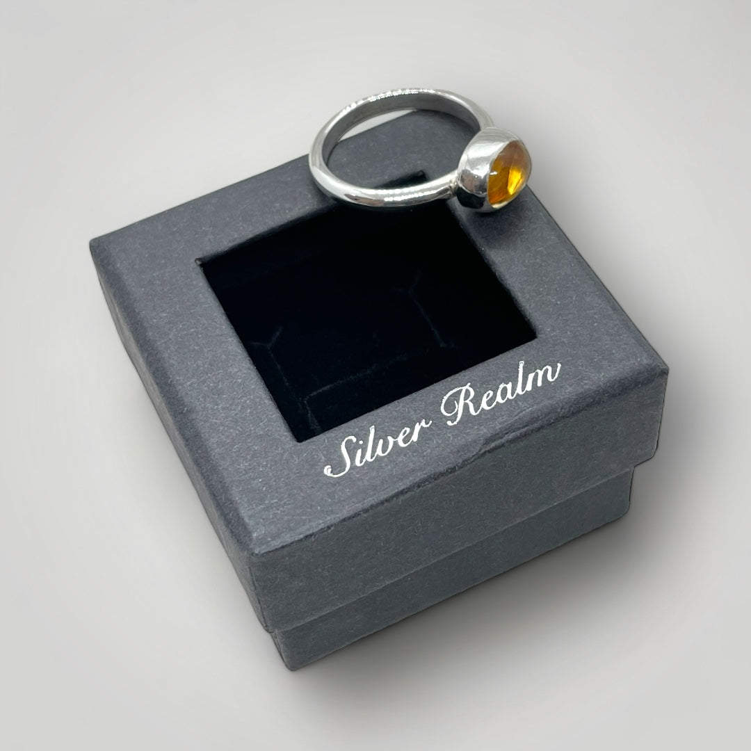 a sterling silver ring set with Citrine