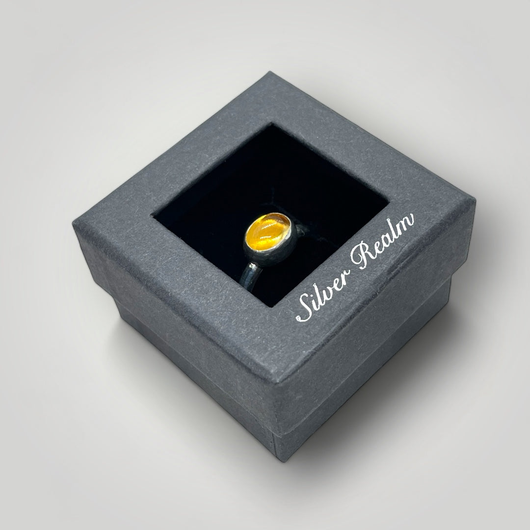 a sterling silver ring set with Citrine