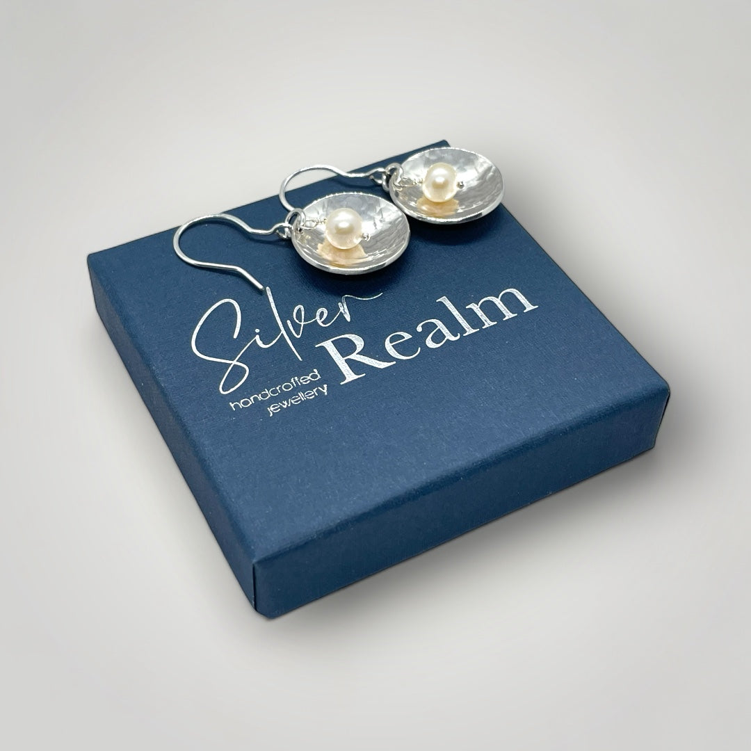 Pearl and hammered sterling silver dangly earrings