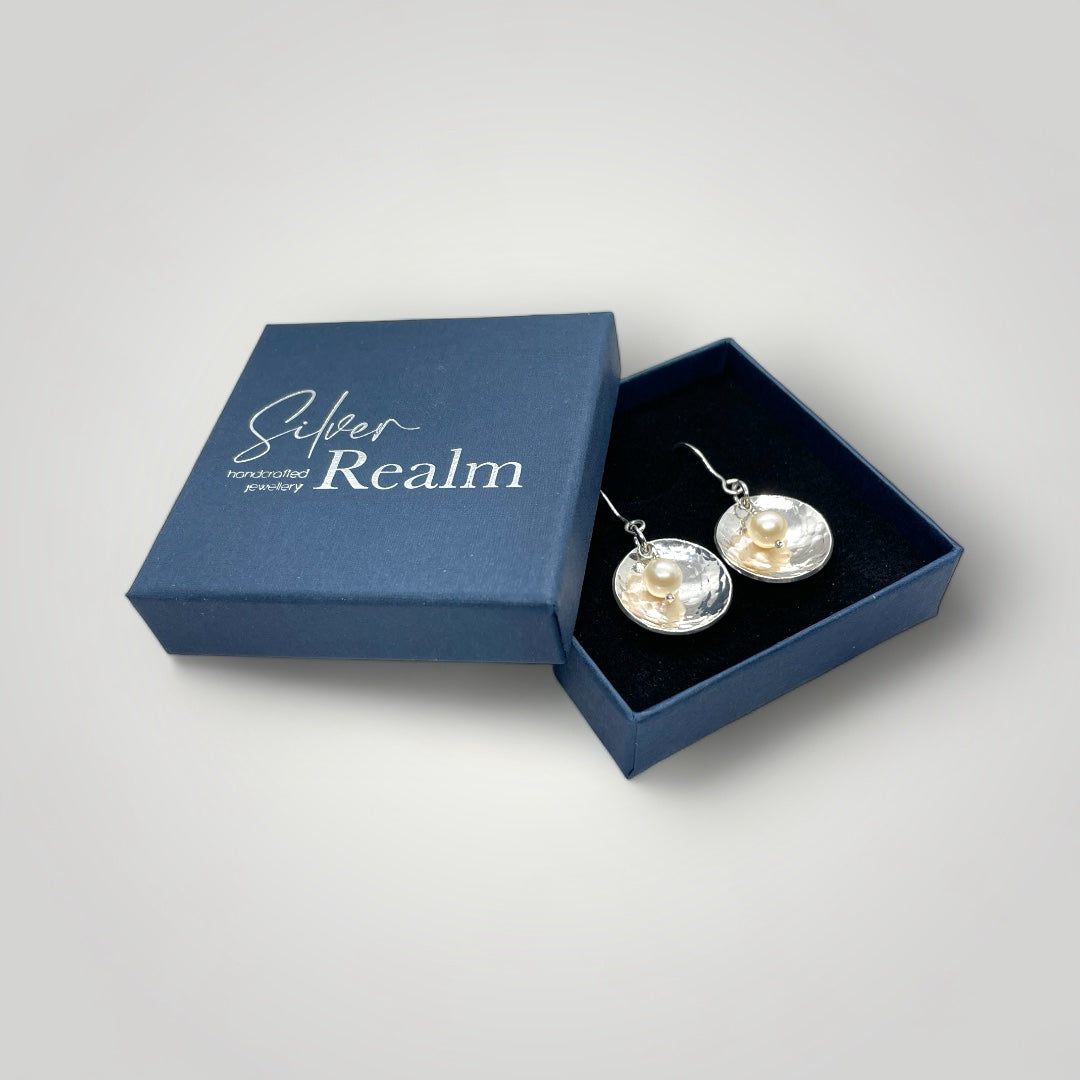 Pearl and hammered sterling silver dangly earrings