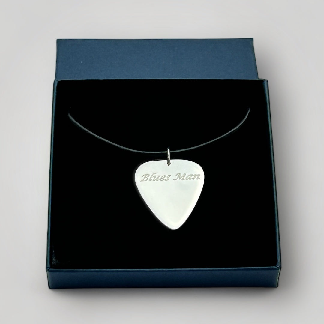Silver guitar pick necklace on leather cord in gift box