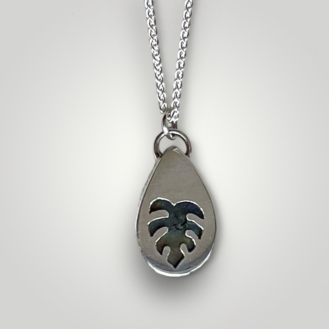 Labradorite and sterling silver teardrop pendant on a sterling silver chain with leaf detail on reverse