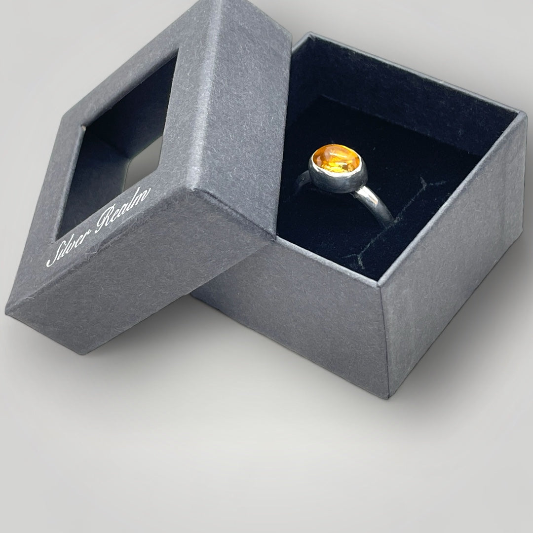a sterling silver ring set with Citrine