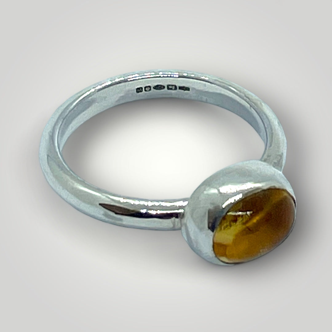 a sterling silver ring set with Citrine