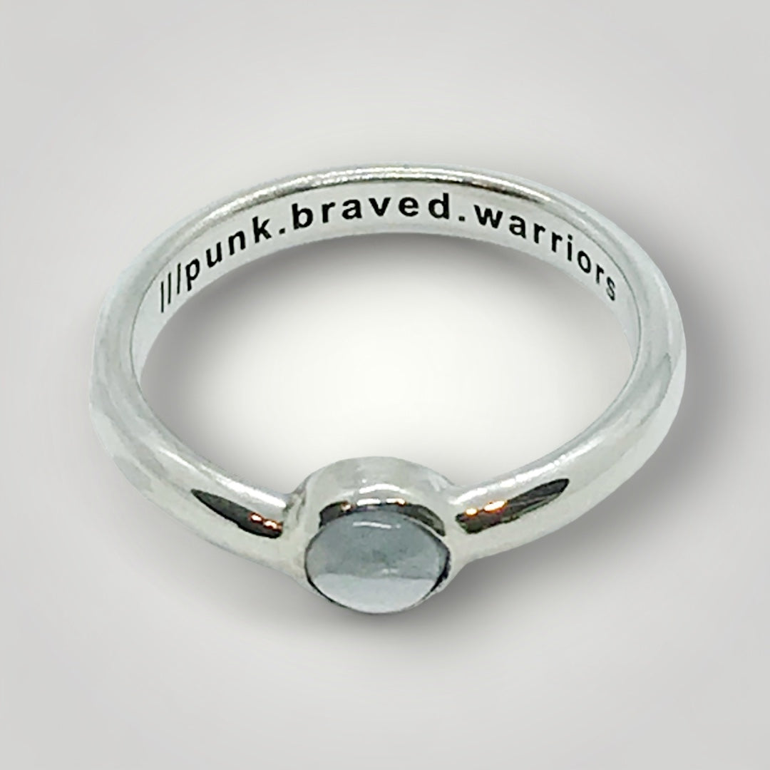 a sterling silver what3words ring set with topaz