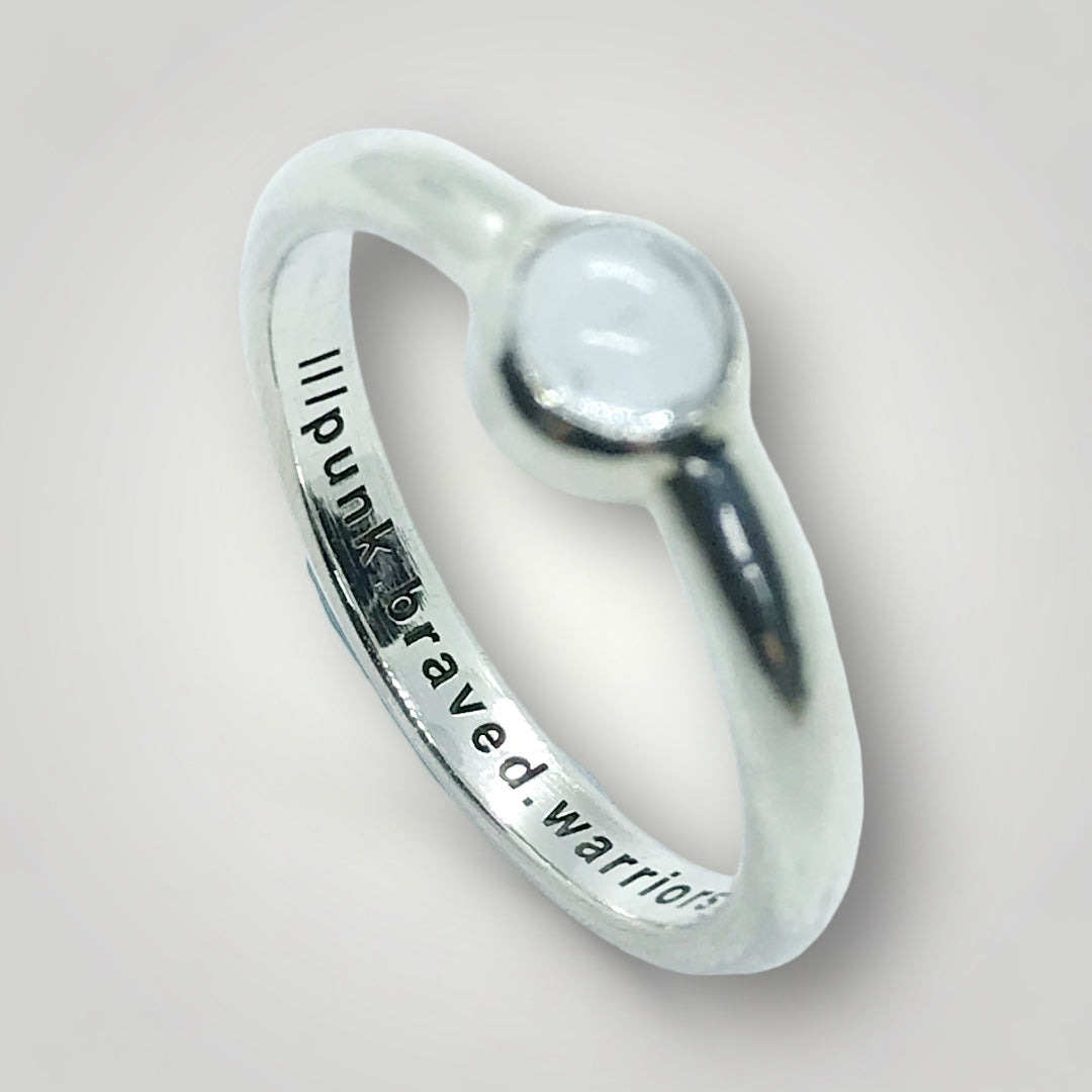 a sterling silver what3words ring set with Topaz