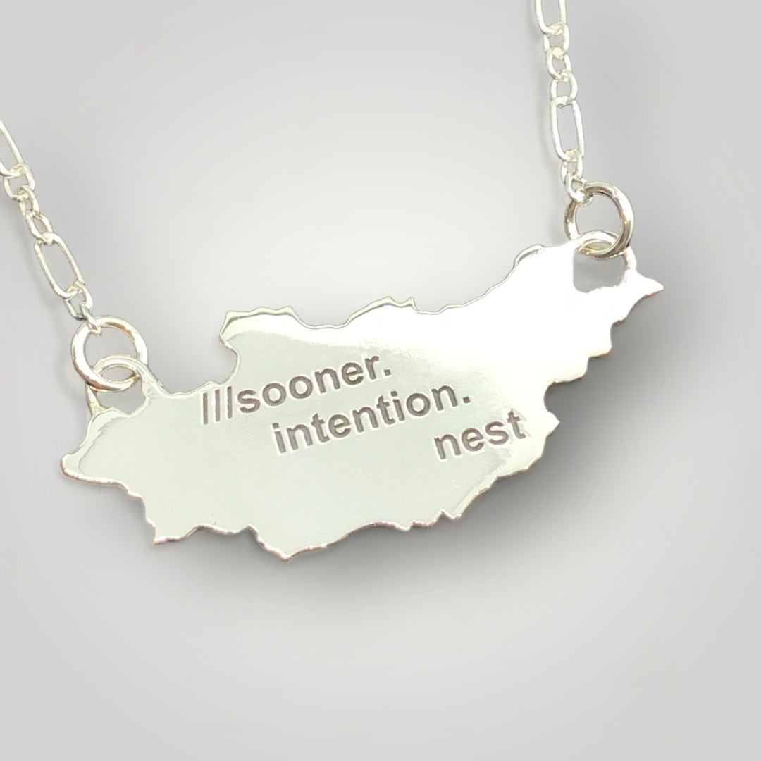 A sterling silver what3words pendant in the shape of your chosen country/state