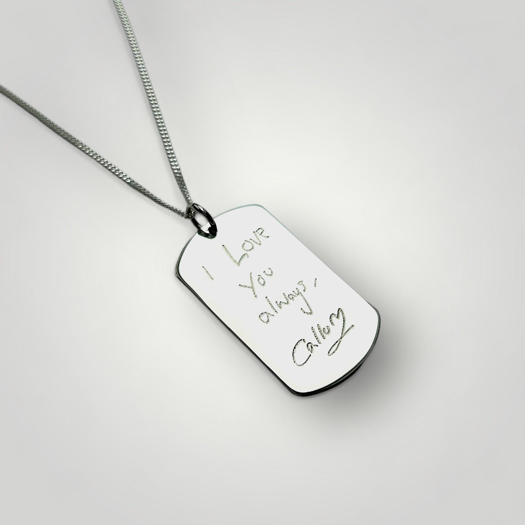 Personalised pendant necklace in sterling silver with engraved handwriting.