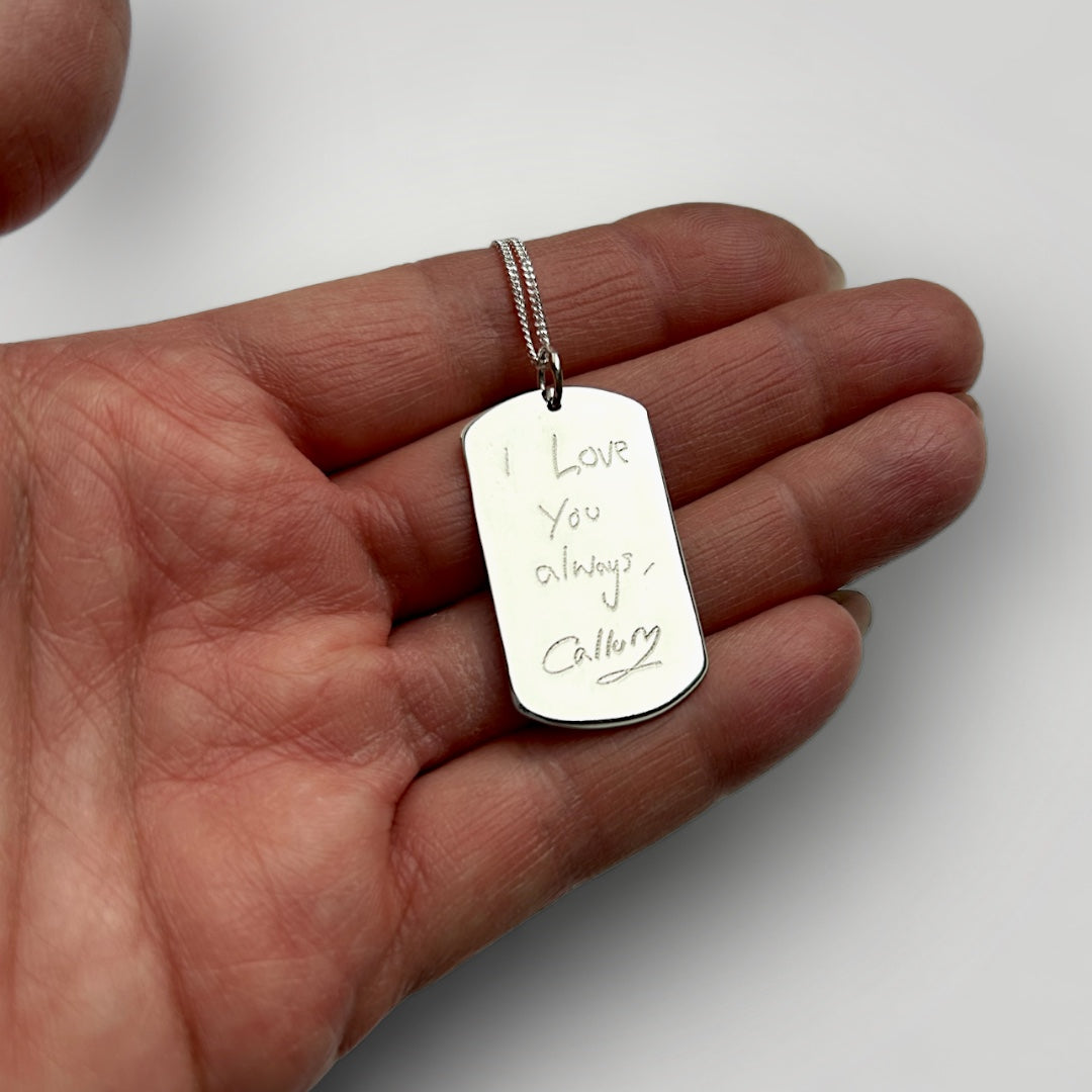 Personalised pendant necklace in sterling silver with engraved handwriting.