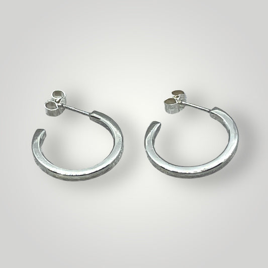 Sterling silver hoop earrings with butterfly closure