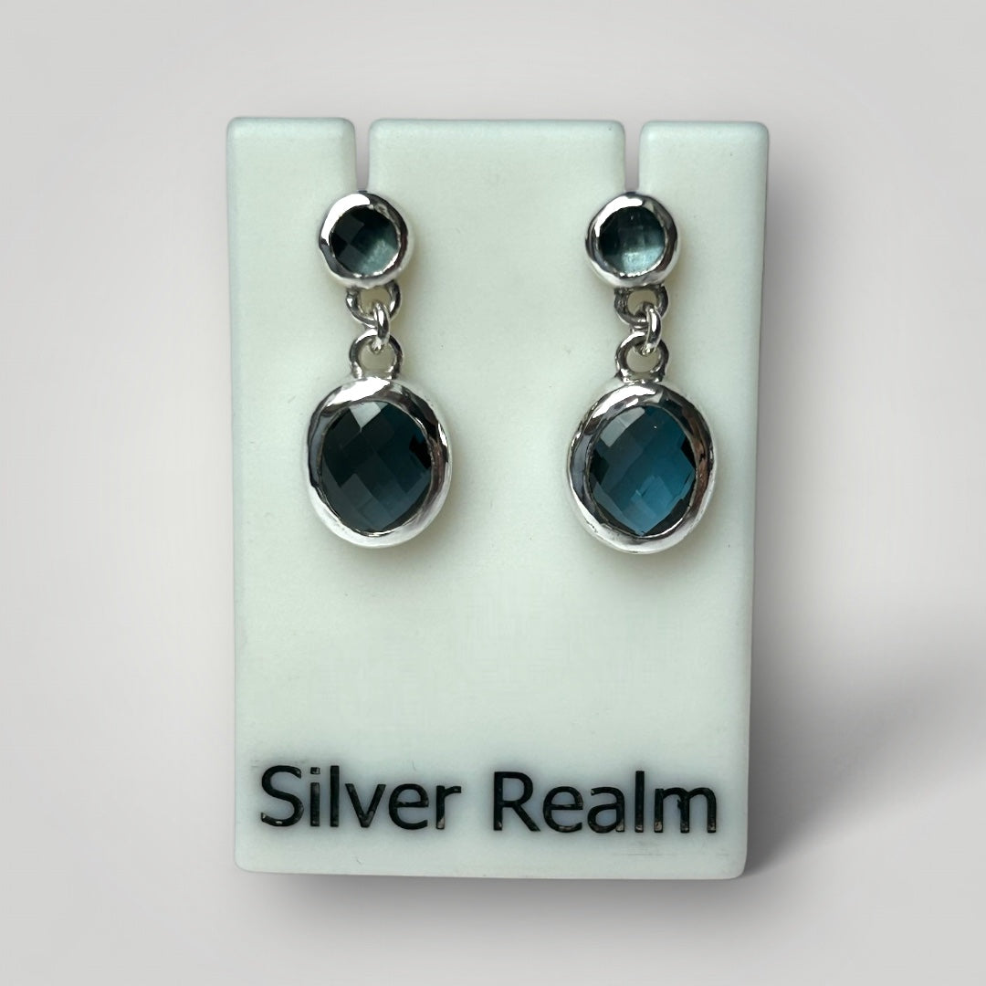 London Blue Topaz and sterling silver earrings on a display card