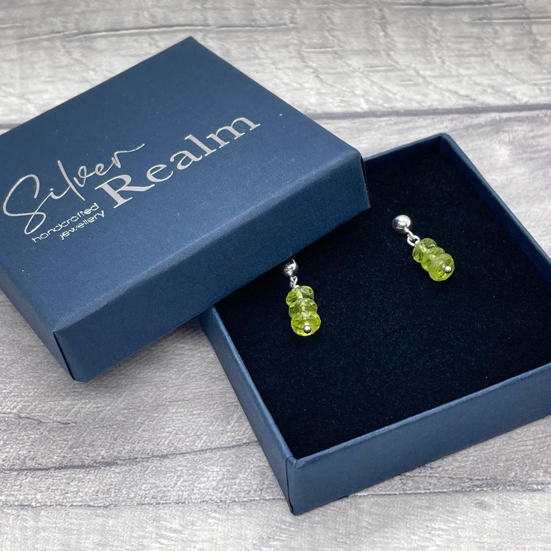 Peridot and sterling silver earrings.  Edit alt text