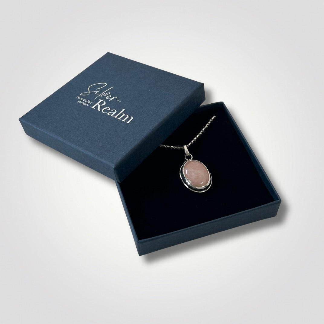 Rose quartz sterling silver pendant necklace displayed in a Silver Realm jewellery box