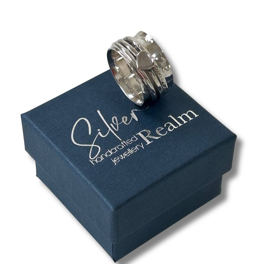 Sterling silver heart spinner ring handmade by Silver Realm Jewellery