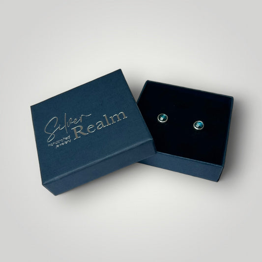Blue Topaz and sterling silver stud earrings in a gift box
