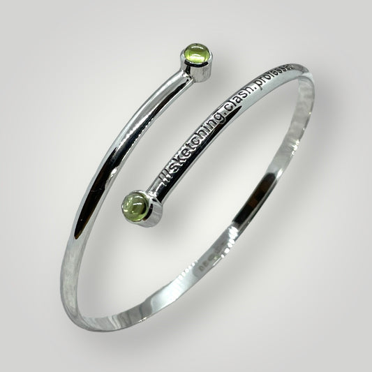 Adjustable sterling silver bangle with two Peridot and engraved with a what3words address of your choice 