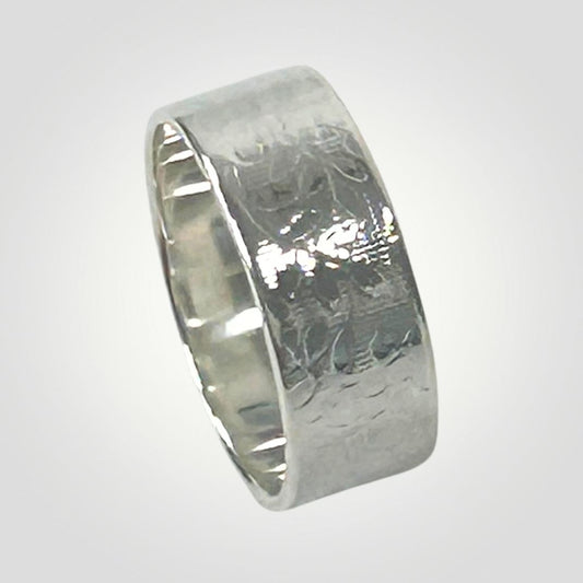Wide sterling silver ring with textured leaf detail